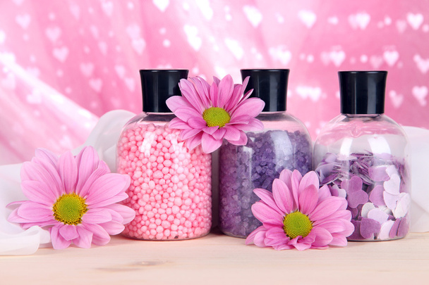 Aromatherapy minerals - colorful bath salt on pink background - Φωτογραφία, εικόνα
