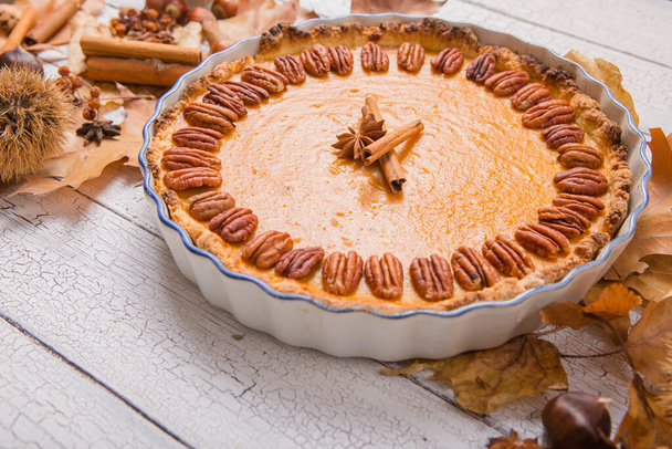 Pecan, Pumpkin, Thanksgiving Holiday Pies on a rustic table with decorative gourds. Top view - Fotó, kép