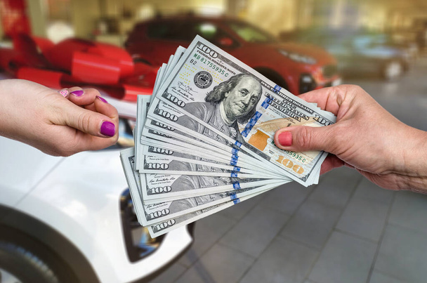 customer giving us money seller for sale or rent new car . - Photo, Image