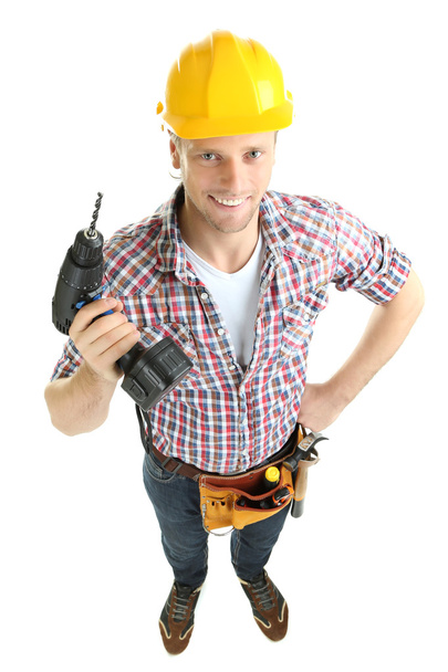 Portrait of young builder isolated on white - Photo, Image