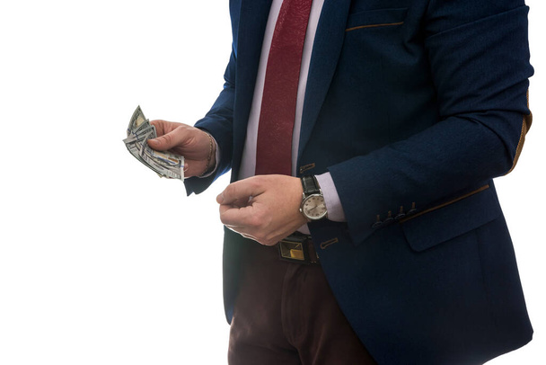Successful businessman holding american dollar cash money isolated on white background - 写真・画像