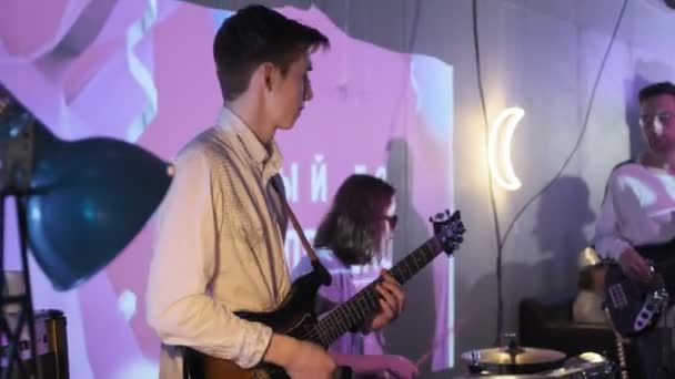 RUSSIA, VLADIMIR, 27 DEC 2019: rock band musicians perform at nightclub party - Filmati, video