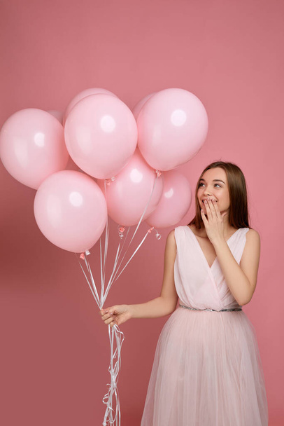 birthday girl posing with balloons - 写真・画像