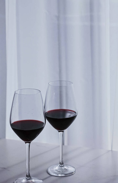 Two glasses of red wine, organic beverage product - Fotó, kép