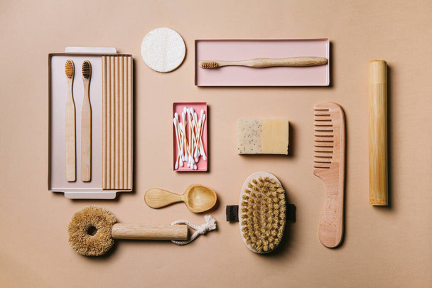 Zero waste. Eco friendly bathroom and kitchen accessories on a beige background. Flat lay, top view. - Foto, immagini
