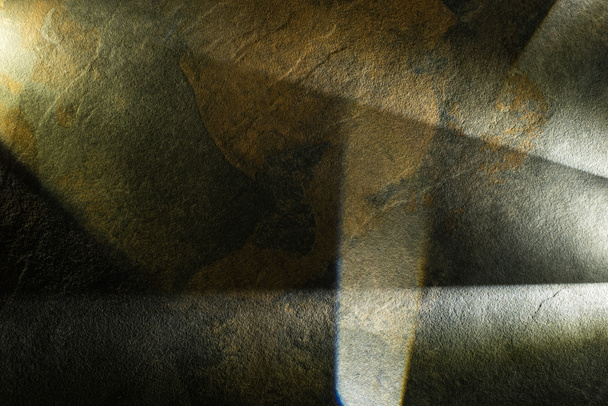 light prism with beams on dark stone texture background - Photo, Image