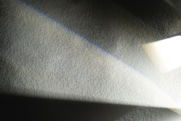 light prism with beams on dark textured background - Photo, image