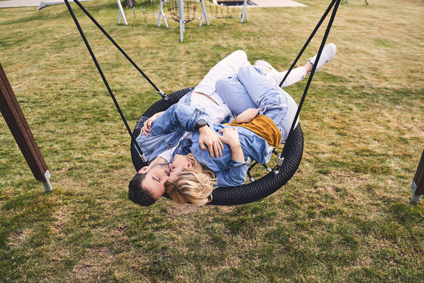 Young couple spending their leisure time outdoors - Foto, imagen