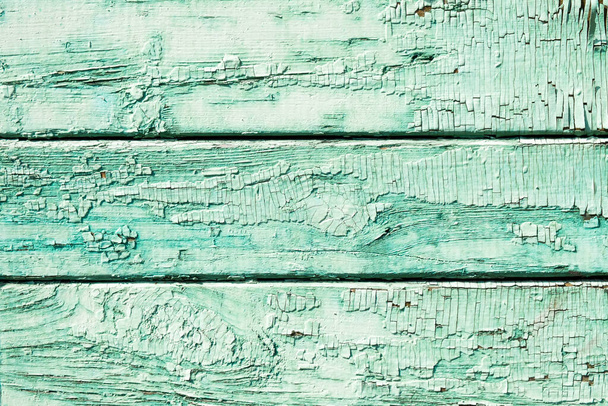 Zelená textura starého dřeva se škrábanci a prasklinami. - Fotografie, Obrázek