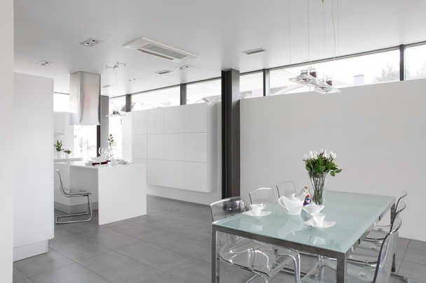Modern white kitchen with stylish furniture - Фото, изображение