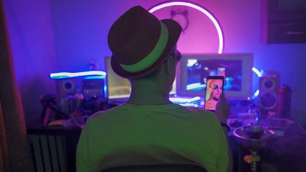Creative Man Makes Selfie Smoking Hookah In Neon Lights - Фото, изображение