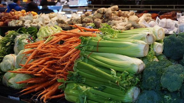 fresh vegetables in market stall, close up - Foto, Bild