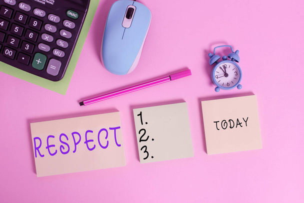 Text sign showing Respect. Conceptual photo Feeling of deep admiration for someone or something Appreciation Notepads mouse alarm clock calculator sheet marker colored background. - Photo, Image