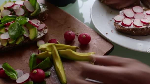 Top view of chef making delicious vegan tartine sandwich - 映像、動画