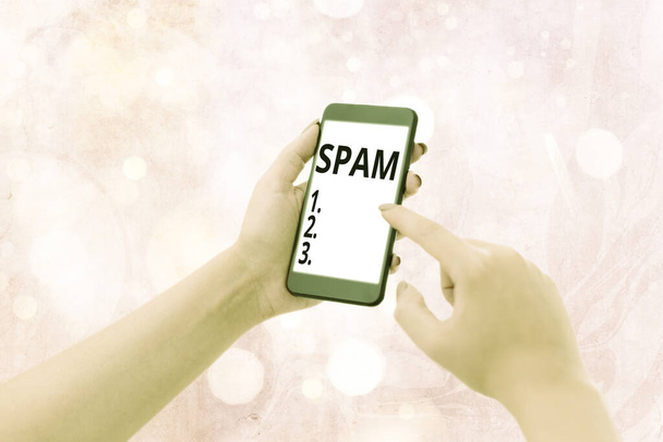 Writing note showing Spam. Business photo showcasing Intrusive advertising Inappropriate messages sent on the Internet. - Photo, Image