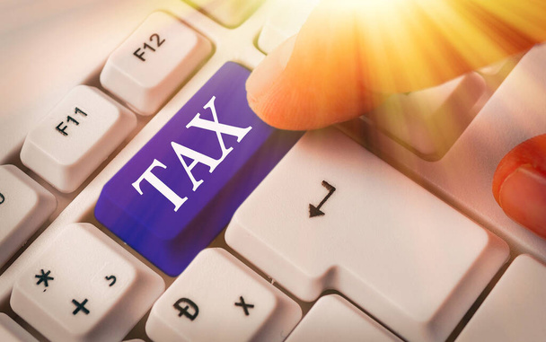 Signo de texto que muestra Tax. Foto conceptual Contribución obligatoria a los ingresos del Estado Impuesto por el gobierno
. - Foto, imagen