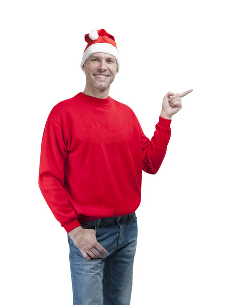 Smiling christmas man wearing a santa hat isolated on the white - Foto, afbeelding