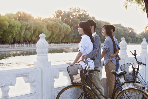 Couples by HouHai Lake with Bicycle - Photo, Image