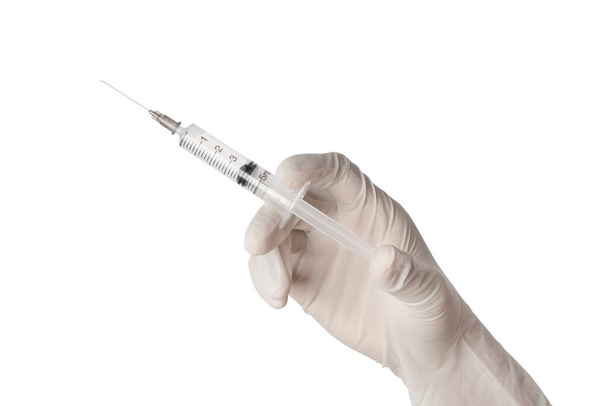 Шприц, медична ін'єкція в руці, медичне обладнання для вакцинації пластику з голкою ізольовано на білому тлі. відсічні контури
. - Фото, зображення