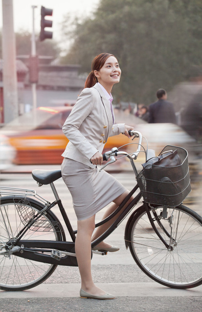 Business Woman commuting with a Bicycle - Photo, Image