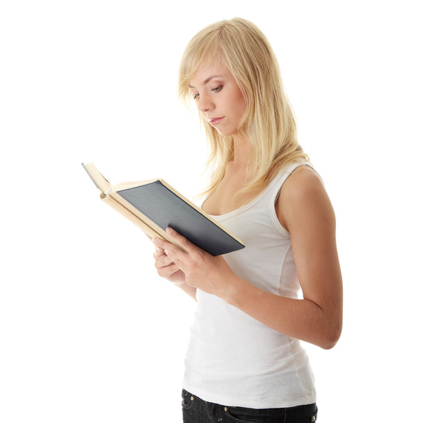 Teen woman reading book - Photo, Image