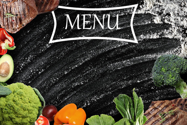 Design of menu with black board, meat and vegetables, space for text - Photo, image