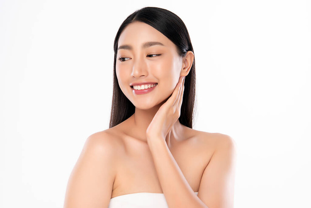 Beautiful Young Asian Woman with Clean Fresh Skin. Face care, Facial treatment, Cosmetology, beauty and healthy skin and cosmetic concept, woman beauty skin isolated on white background. - Photo, Image