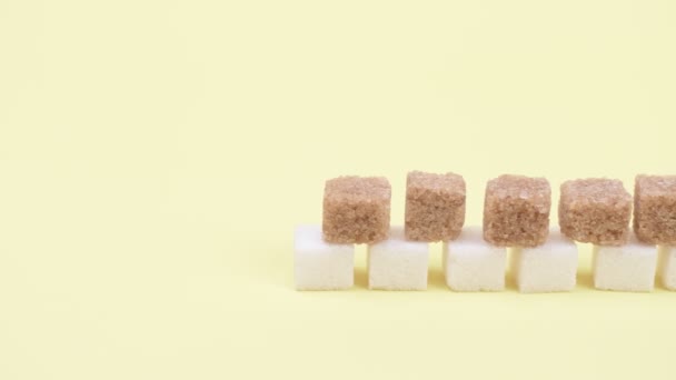 Fehér és barna cukorból készült kockafal.. - Felvétel, videó