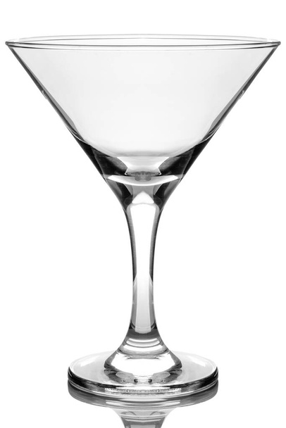 Martini glass on a white glossy background isolation - Foto, Imagen