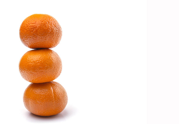 three tangerines white isolated background close-up of free space - Photo, Image