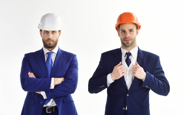 Engineers with beards and serious faces. Construction, engineering, success concept. - Foto, Imagen