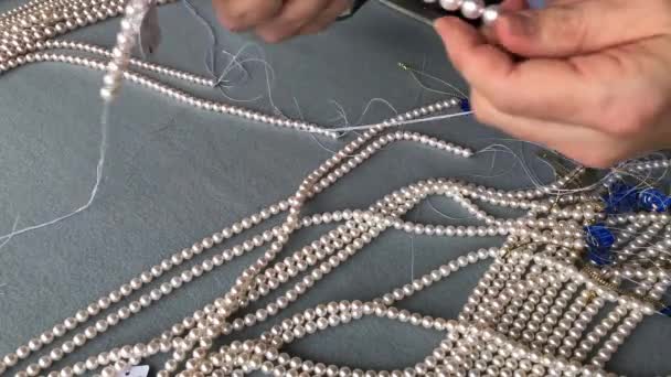 Quality insepction of akoya pearls. - Footage, Video