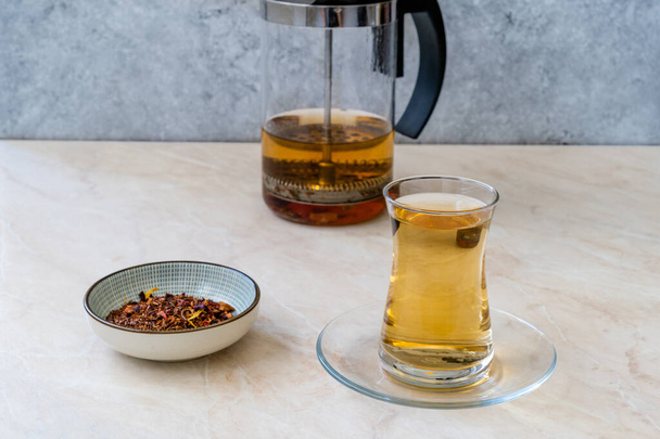 Healthy Traditional Herbal Rooibos Beverage Tea with Dried Spices and French Press. Organic Beverage. - Φωτογραφία, εικόνα