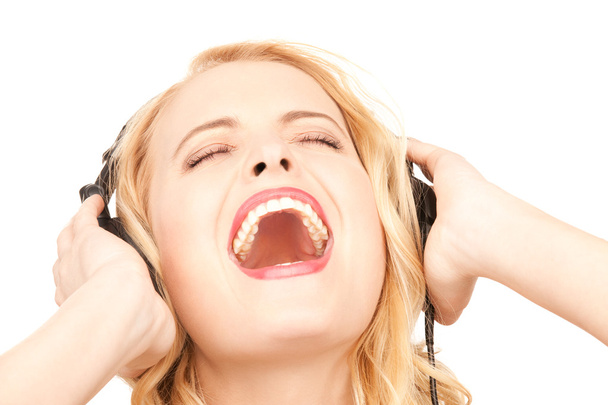 Happy woman in headphones - Valokuva, kuva