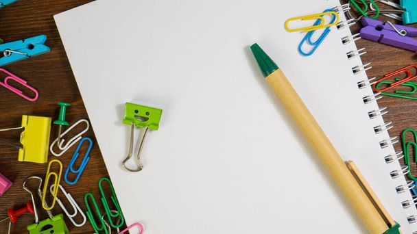 Smiles Binder Clips with School Office Supplies - Photo, Image