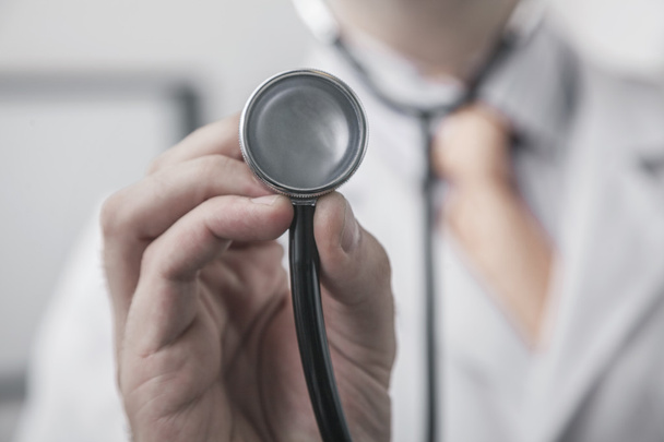 Doctor holding a stethoscope - Photo, Image