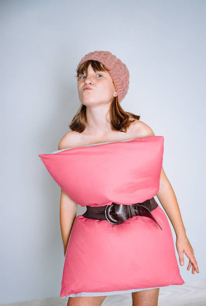 studio photo of a girl in pillow dress, pillow challenge, covid flash mob - Фото, зображення