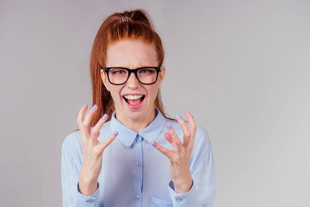 annoying redhaired ginger woman feeling irritation and anger studio background - Photo, Image