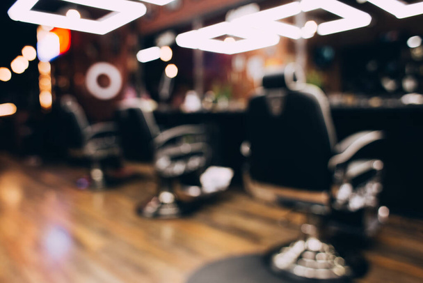 modern empty barbershop interior with chairs, mirrors and lamps. - Foto, Imagem