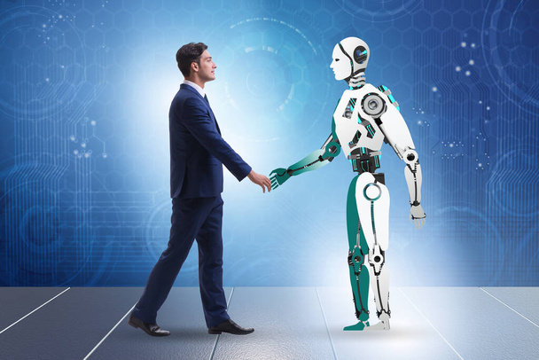 Concept of cooperation between humans and robots - Photo, Image
