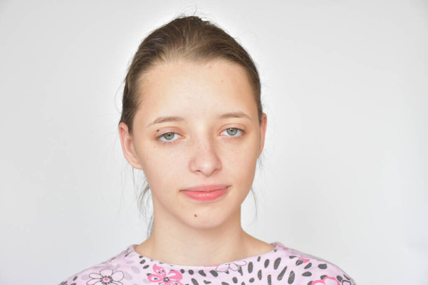 portrait of a girl against white background - Photo, Image