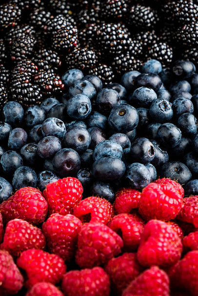beautiful juicy berries. blackberries, raspberries and blueberries. summer food background. - Photo, Image