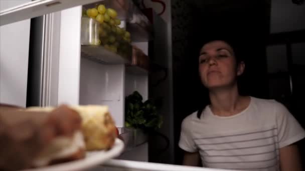 Dieting woman resisting temptation to eat dessert - Felvétel, videó