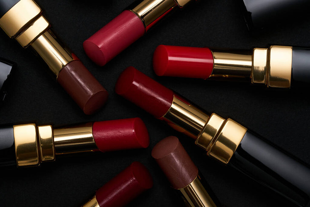 Lipstick in various fashionable shades. - Zdjęcie, obraz