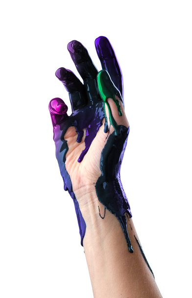 Elegant female hand in black latex glove on a white background. Female hand in liquid black oil or black acrylic paint - Fotografie, Obrázek
