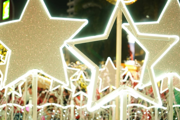 Shining, bright star-shaped lights decoration. - Photo, Image