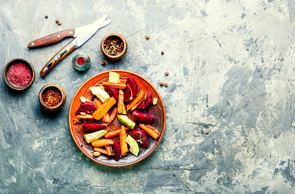 Diet salad with caramelized carrots, avocado and beets.Fresh salad - Photo, Image