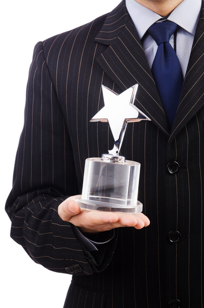 Бізнесмен з зірковою нагородою ізольовано на білому
 - Фото, зображення