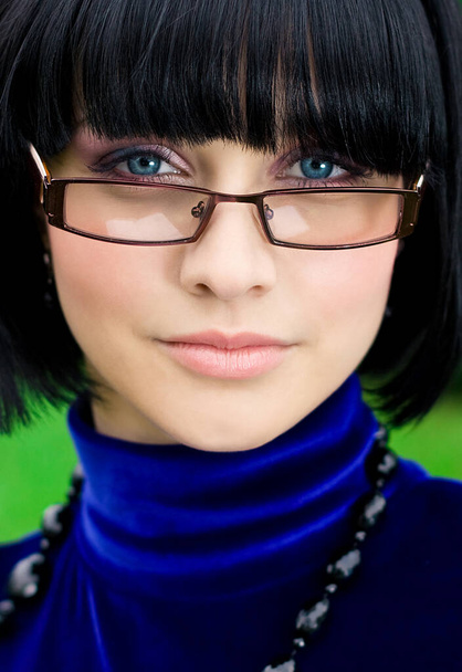 young serious woman in glasses - Foto, immagini