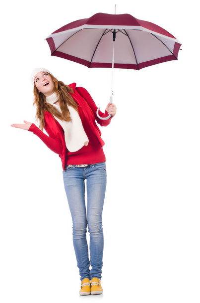 Young woman with umbrella on white - Фото, изображение